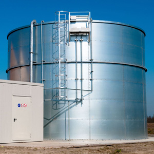 A large silver fire safety water storage tank installation